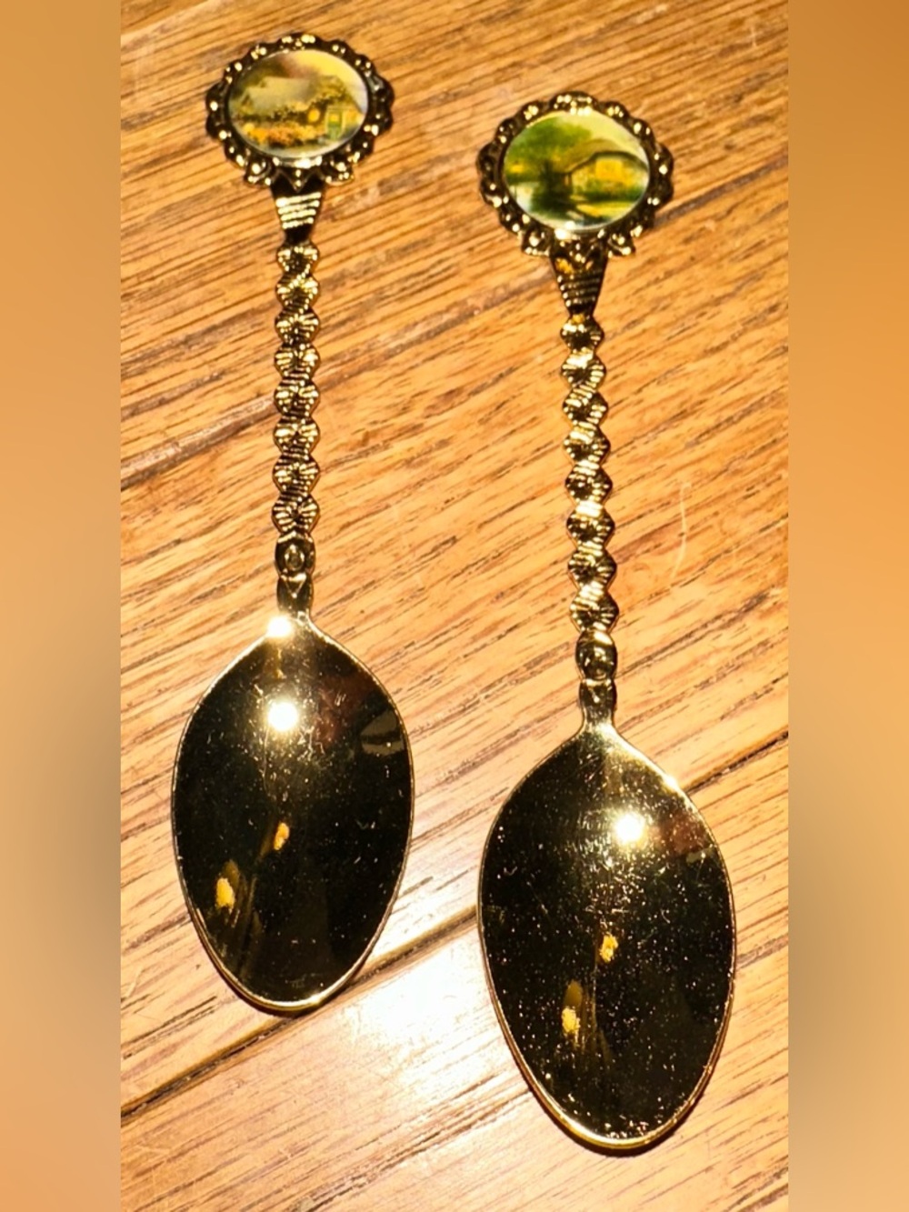 Thomas Kinkade Gold-Tone Decorative Souvenir Spoon Pair